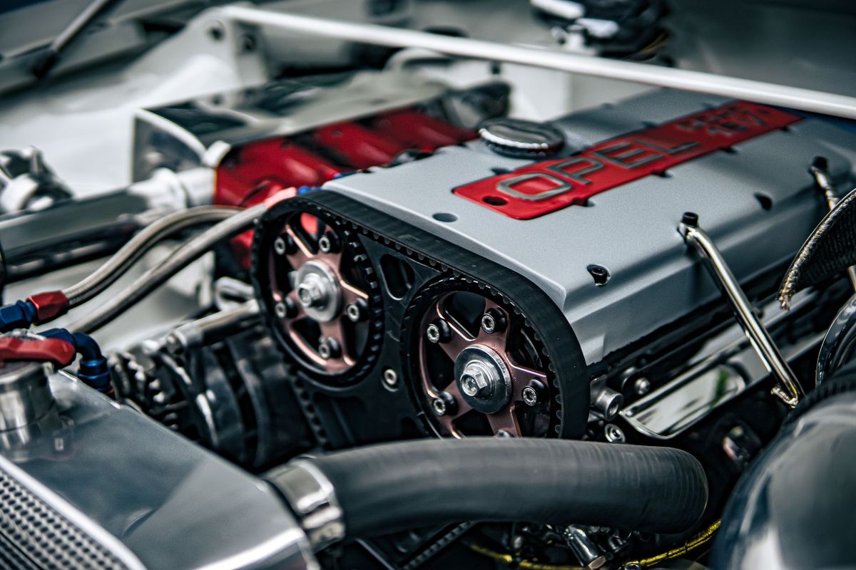 mechanic checking car battery