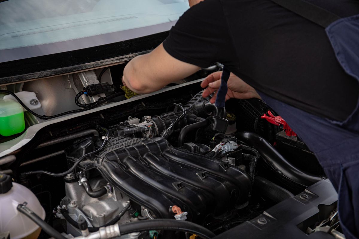 Car Battery Died in Parking Garage: Tow or Jump Start?